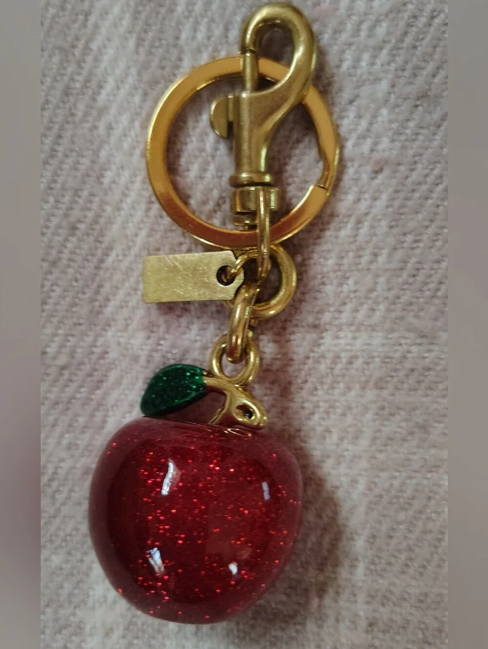Source Unknown Gold-Tone Red Glitter Apple Keychain with Green Leaf Charm